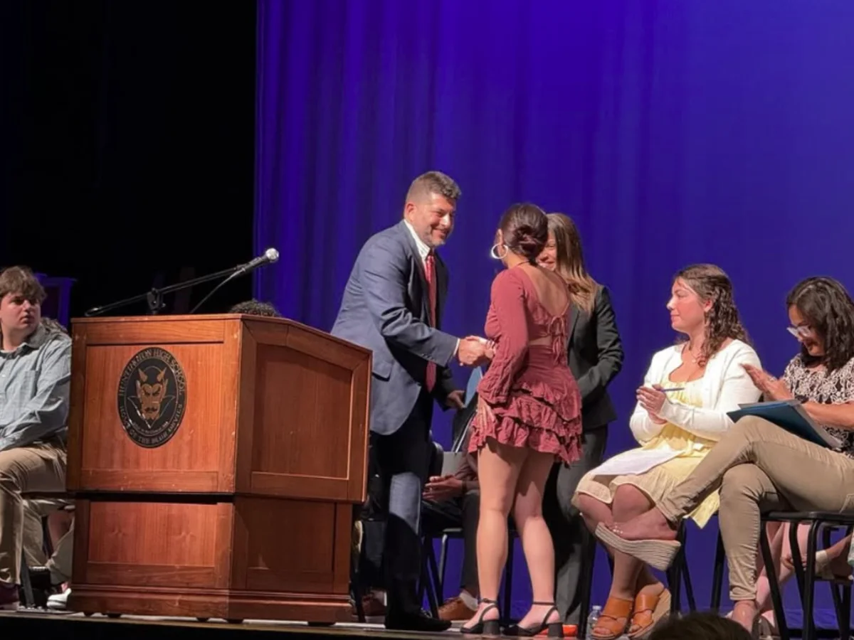 Scholarship presentation on stage at Huntington High School