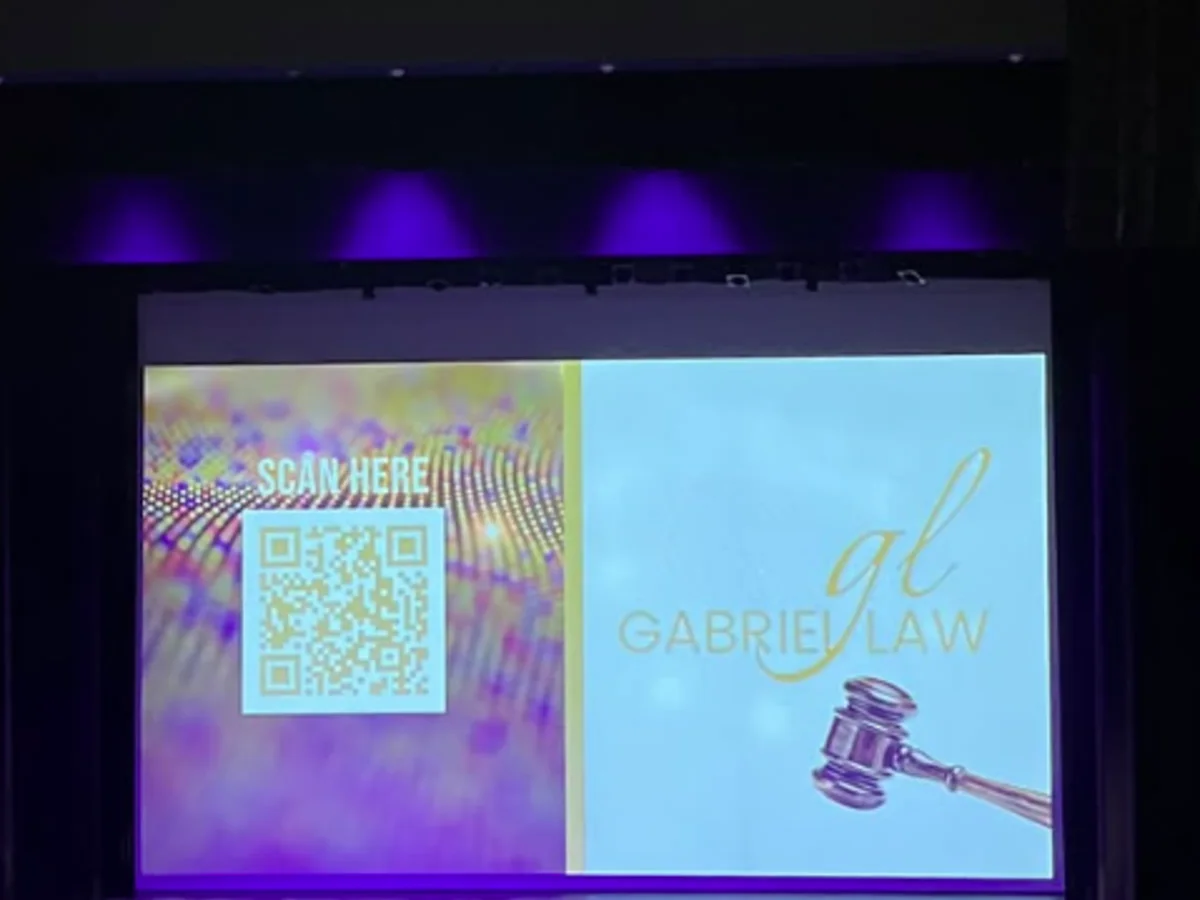 Gabriel Law sponsor slide at the KR3TS Dance Company anniversary gala