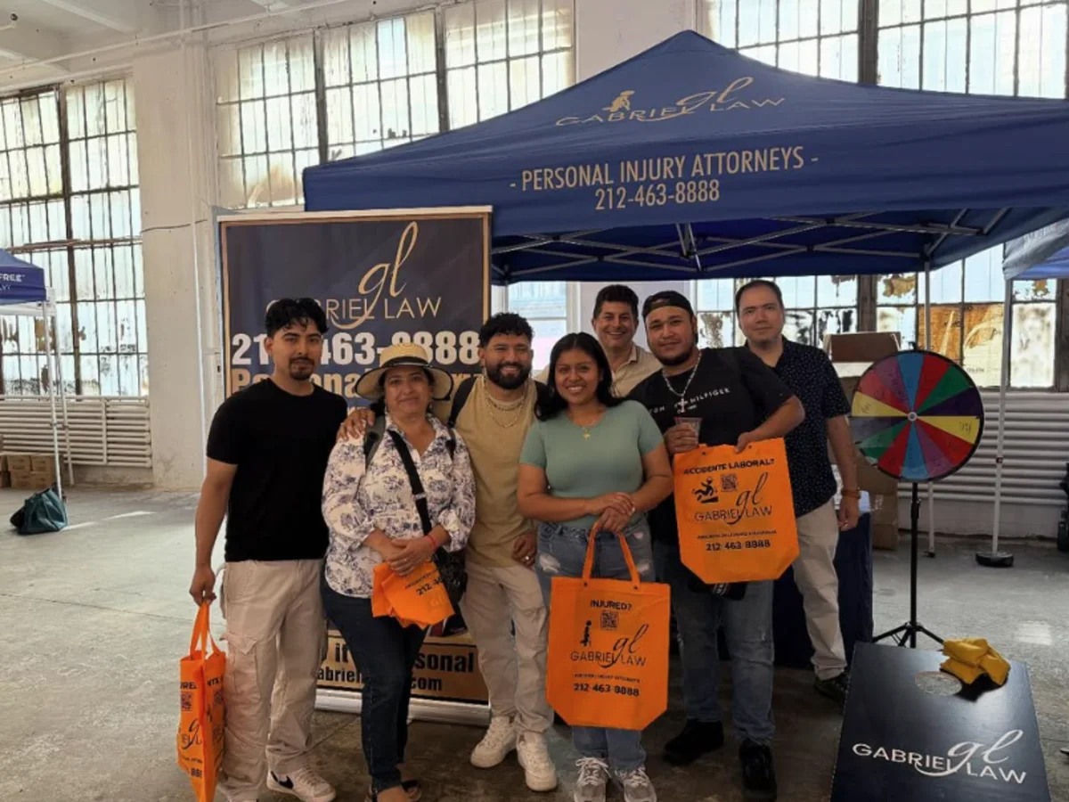 Attendees at the Gabriel Law tent during the Latin Food Fest in Brooklyn